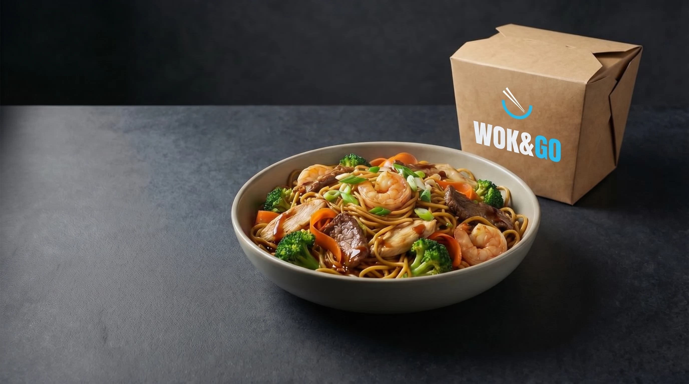Wok & Go noodle bowl with branded takeaway box